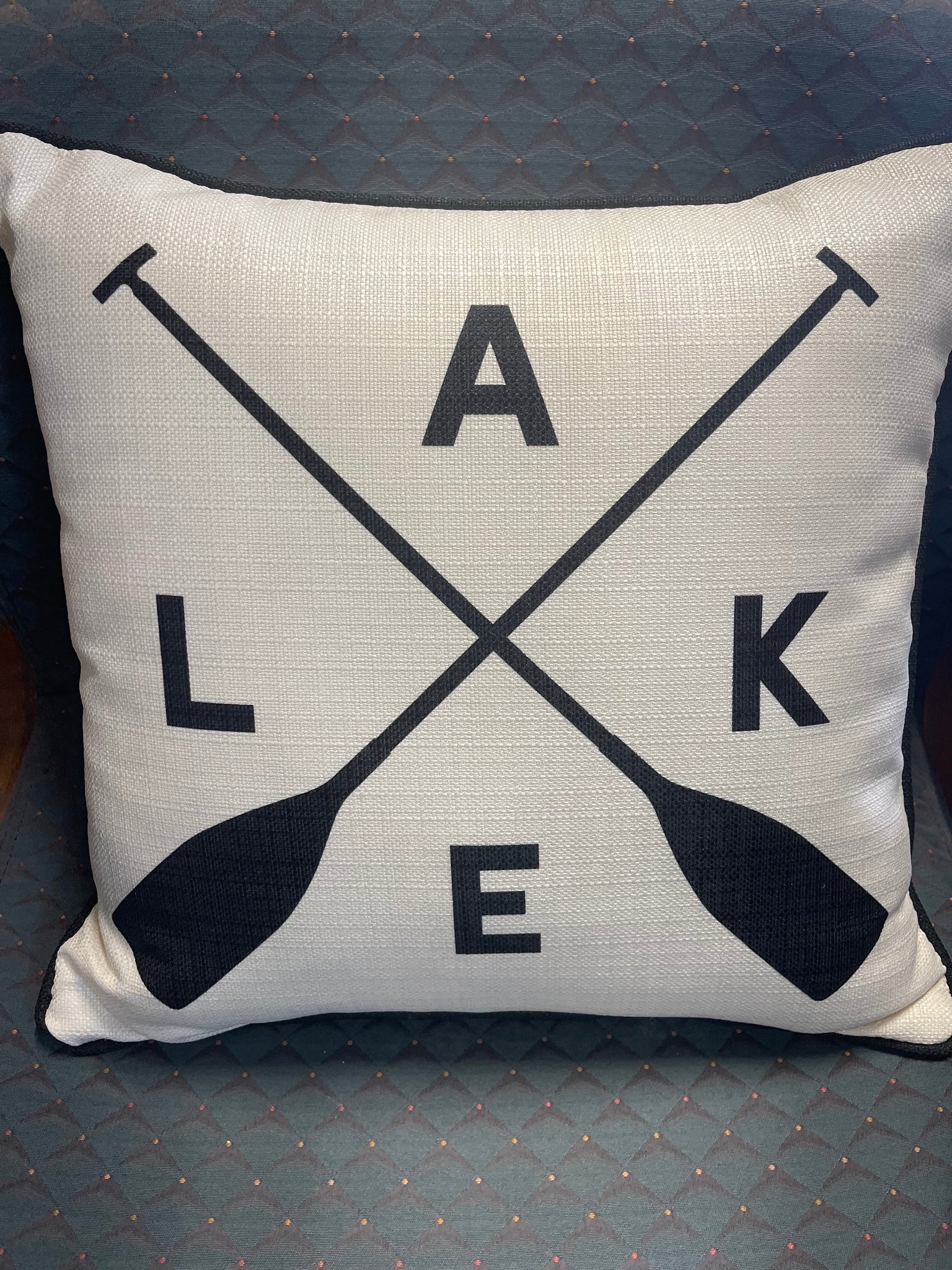 Lake with crossed oars pillow, black piping